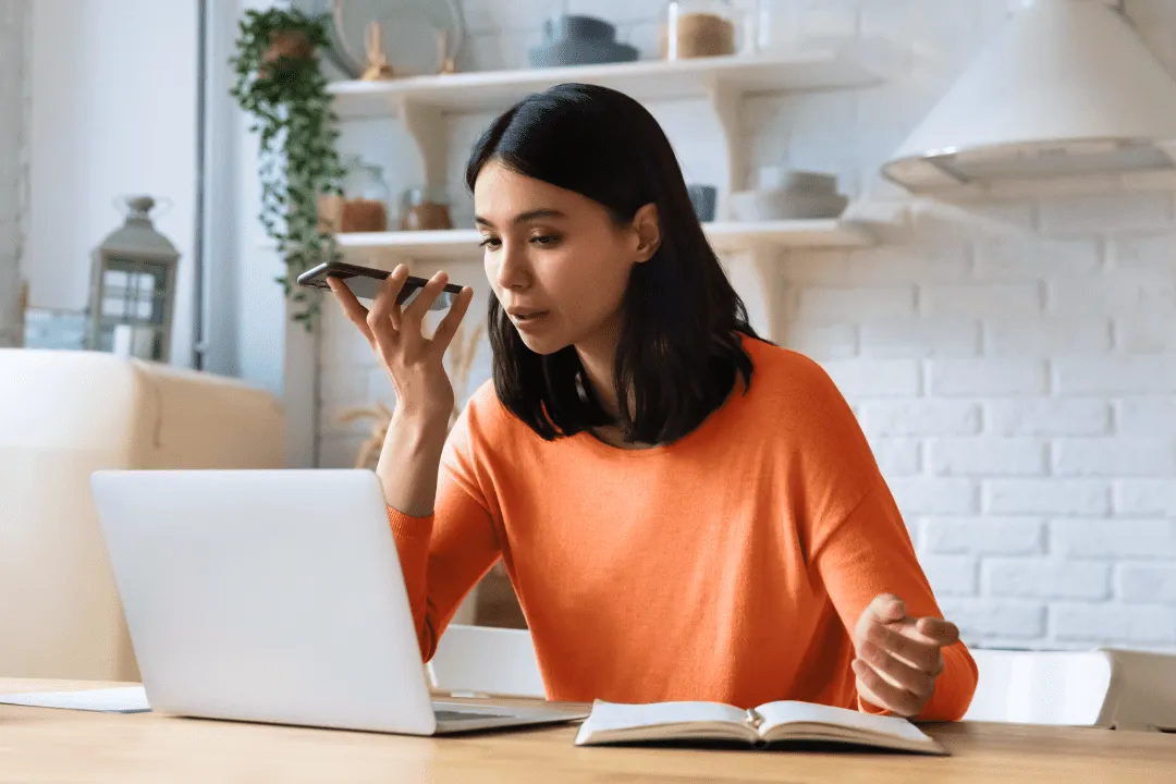 A girl talks through an online translator