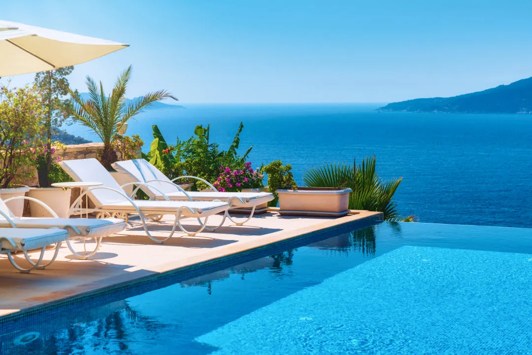 Sun loungers near a panoramic pool