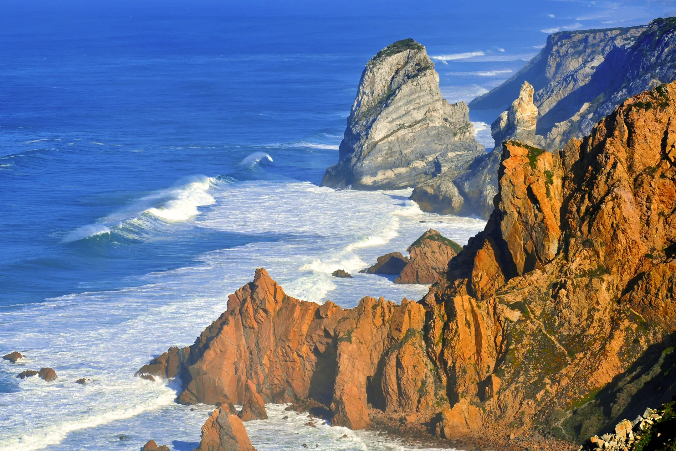 Golden cliffs by the water