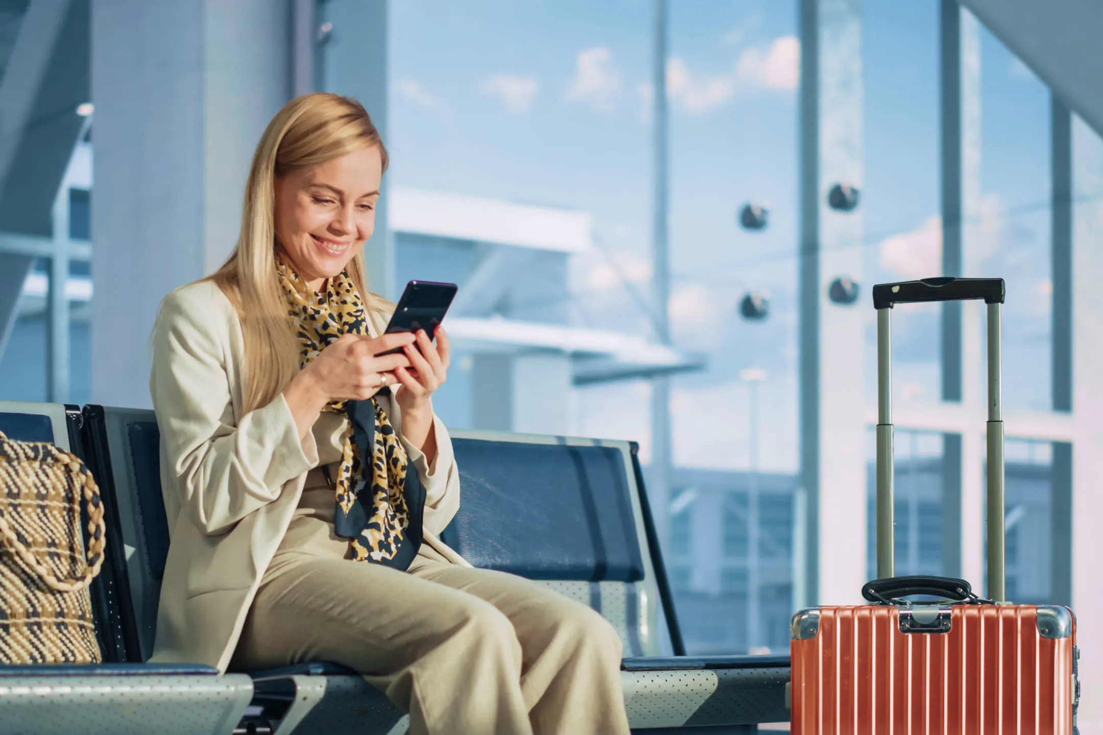 Girl at the airport with a phone