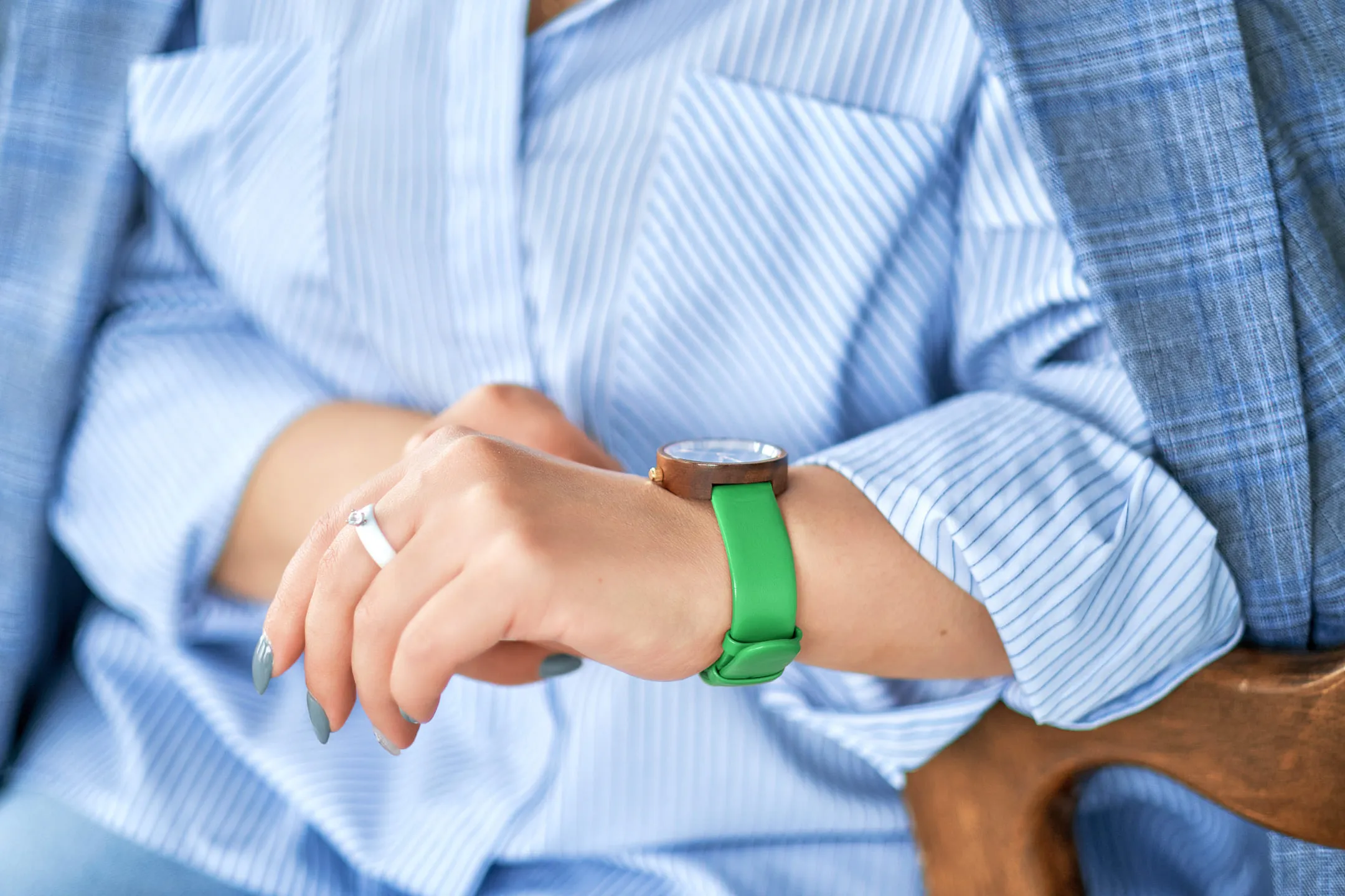 Girl checking time on her watch