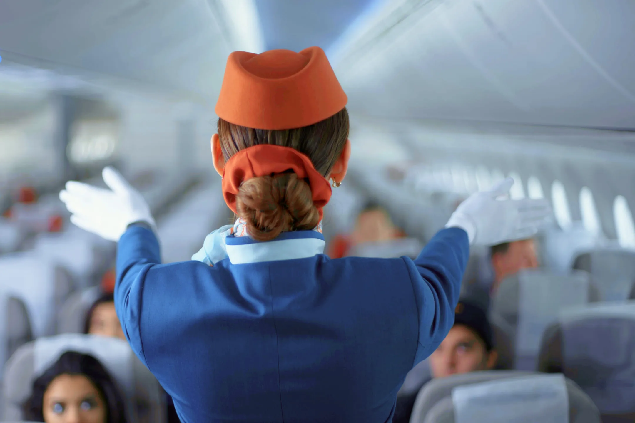 Flight attendant explains rules of conduct on the plane