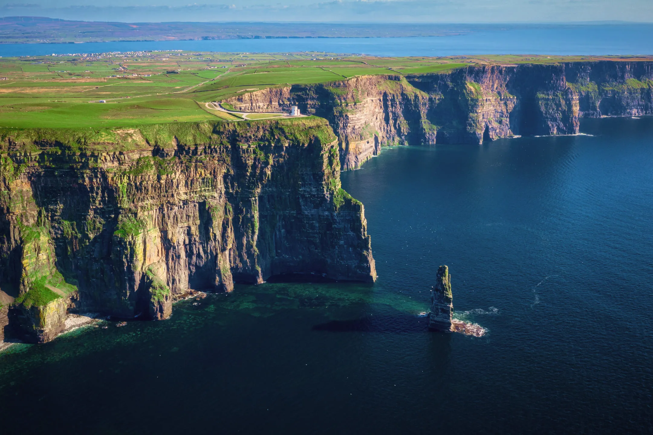 Plain with a cliff by the sea