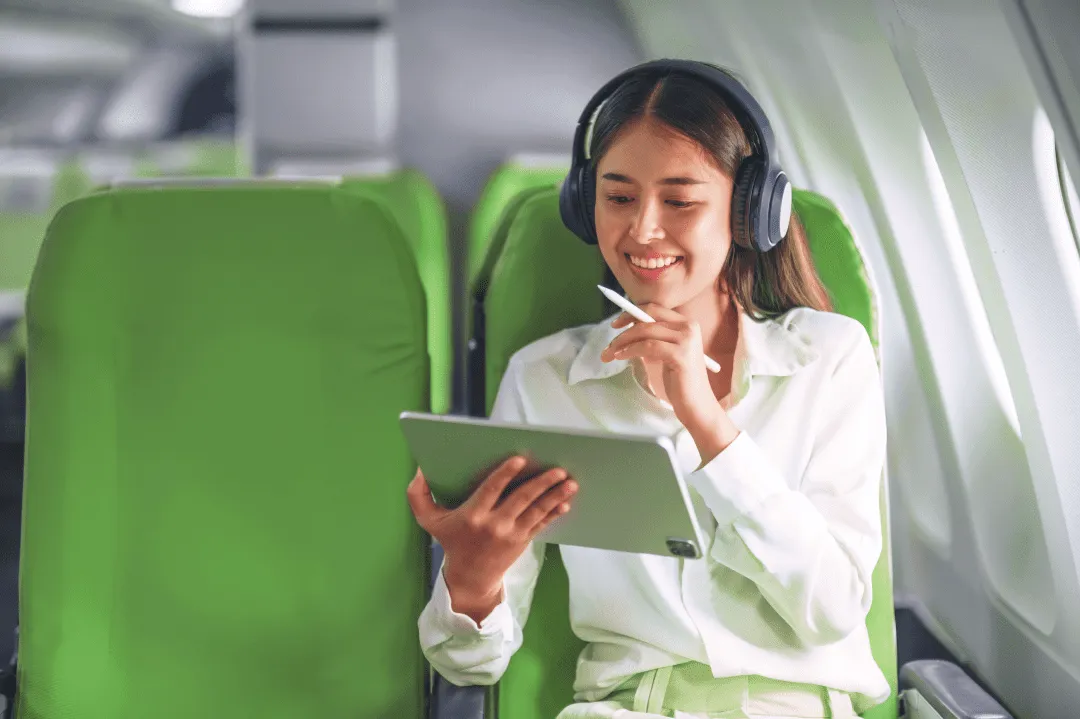 Girl working on board an airplane