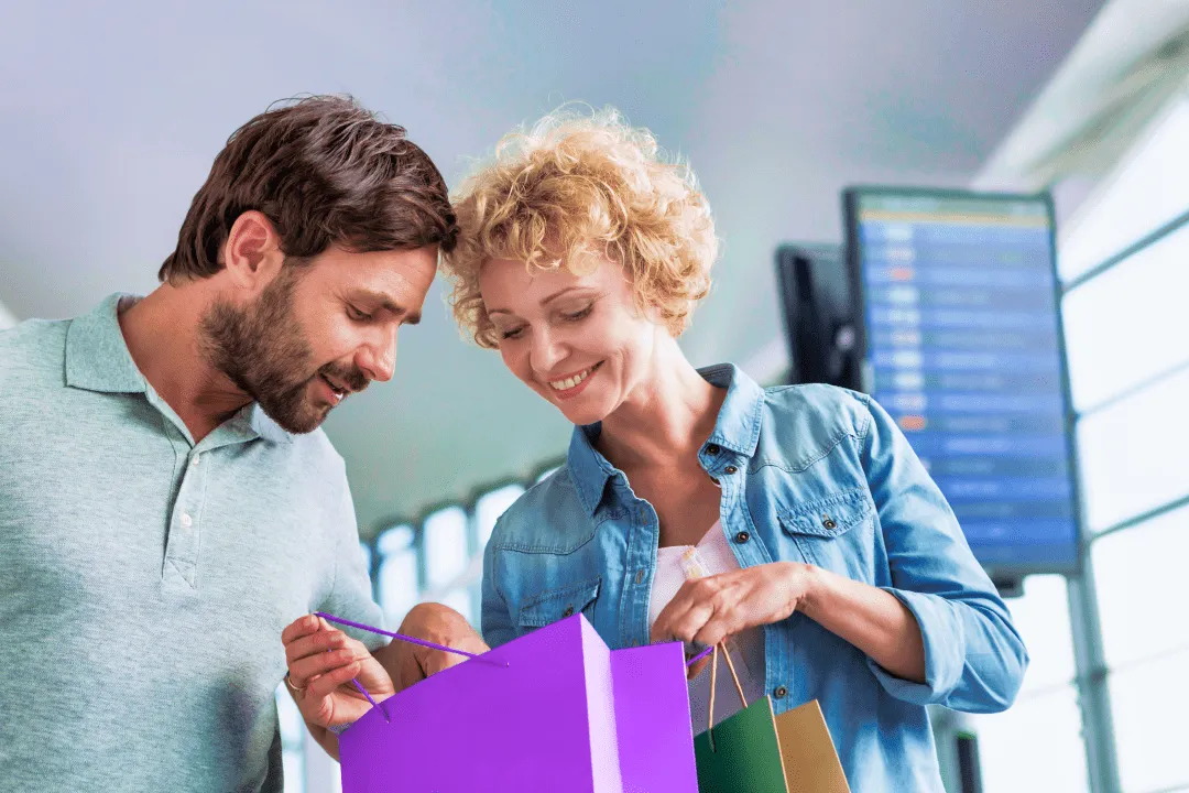 Couple checking purchases in a bag