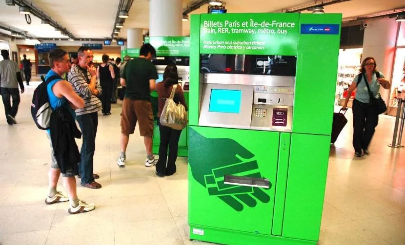 train ticket that needs to be printed at a self-service kiosk