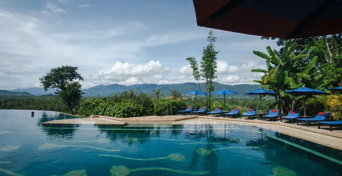 infinity pool of Anantara Golden Triangle Elephant Camp & Resort