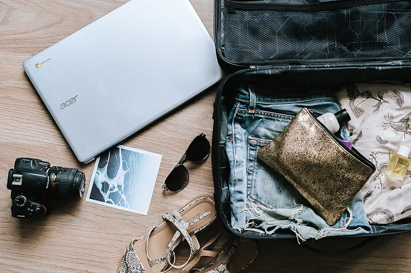 Suitcase with travel items