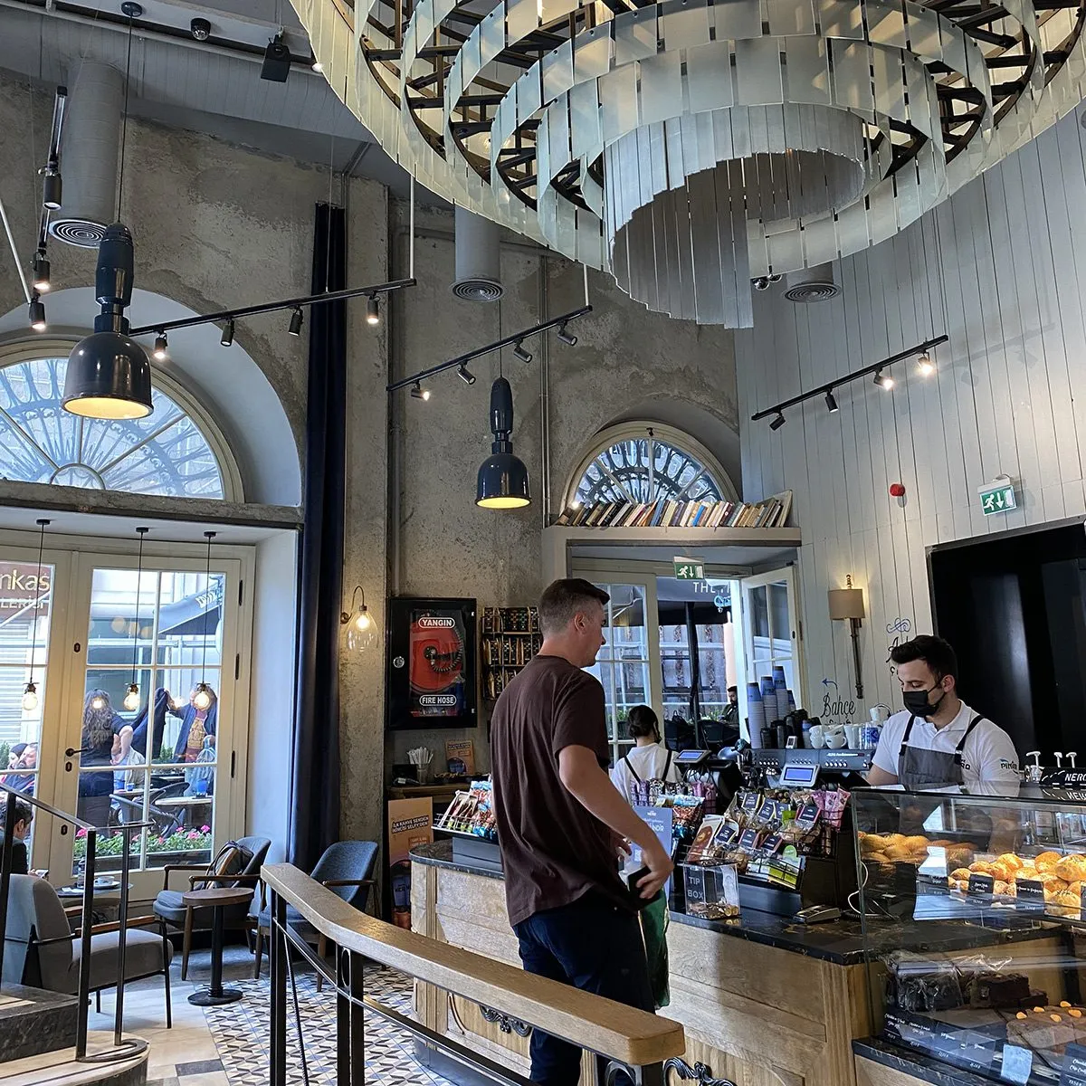 Man paying at the cafe counter