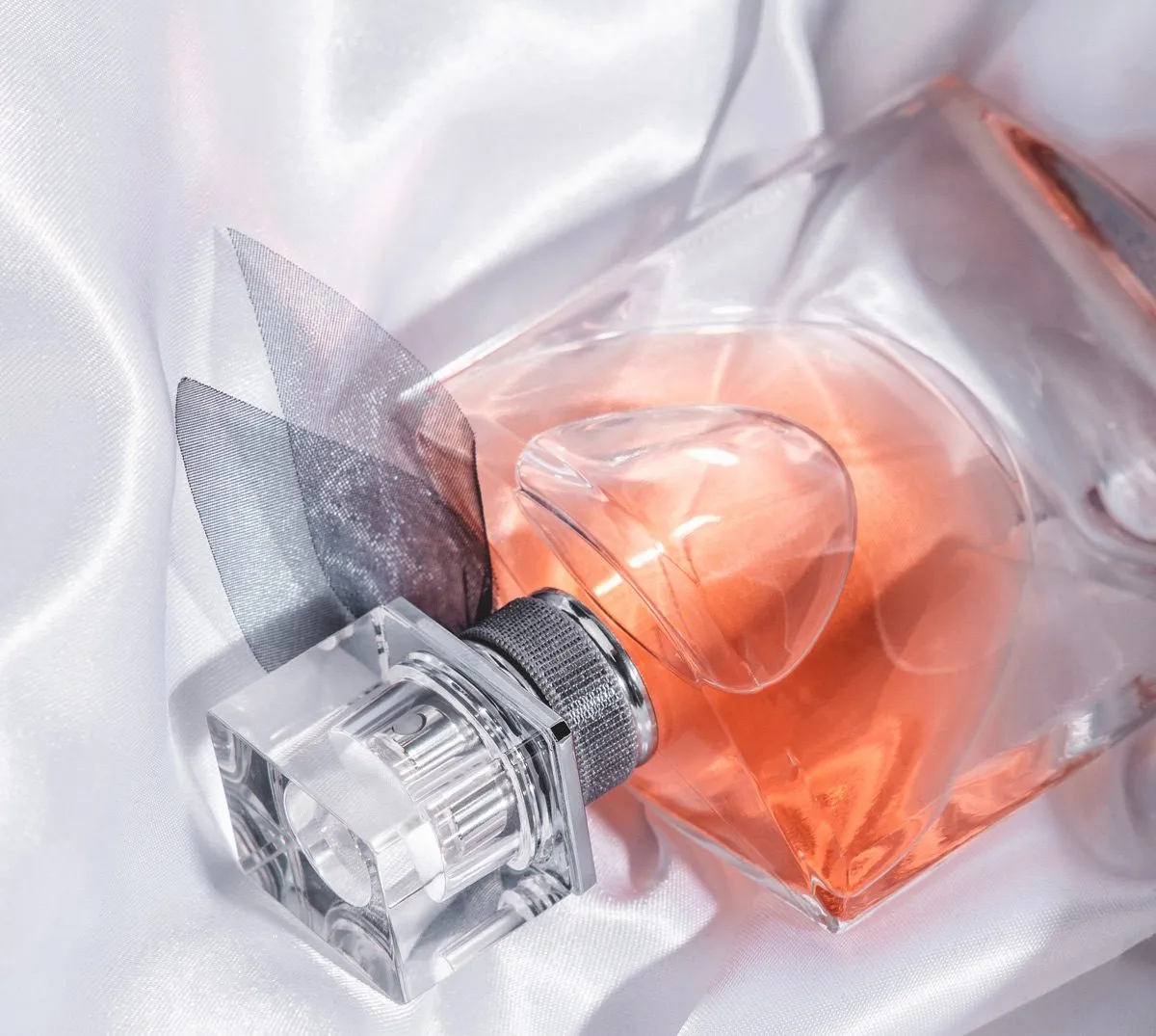 Perfume bottle on fabric