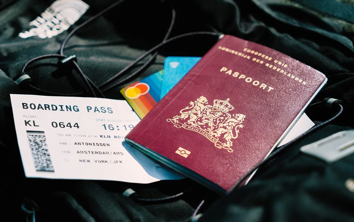 Ticket and passport on a backpack
