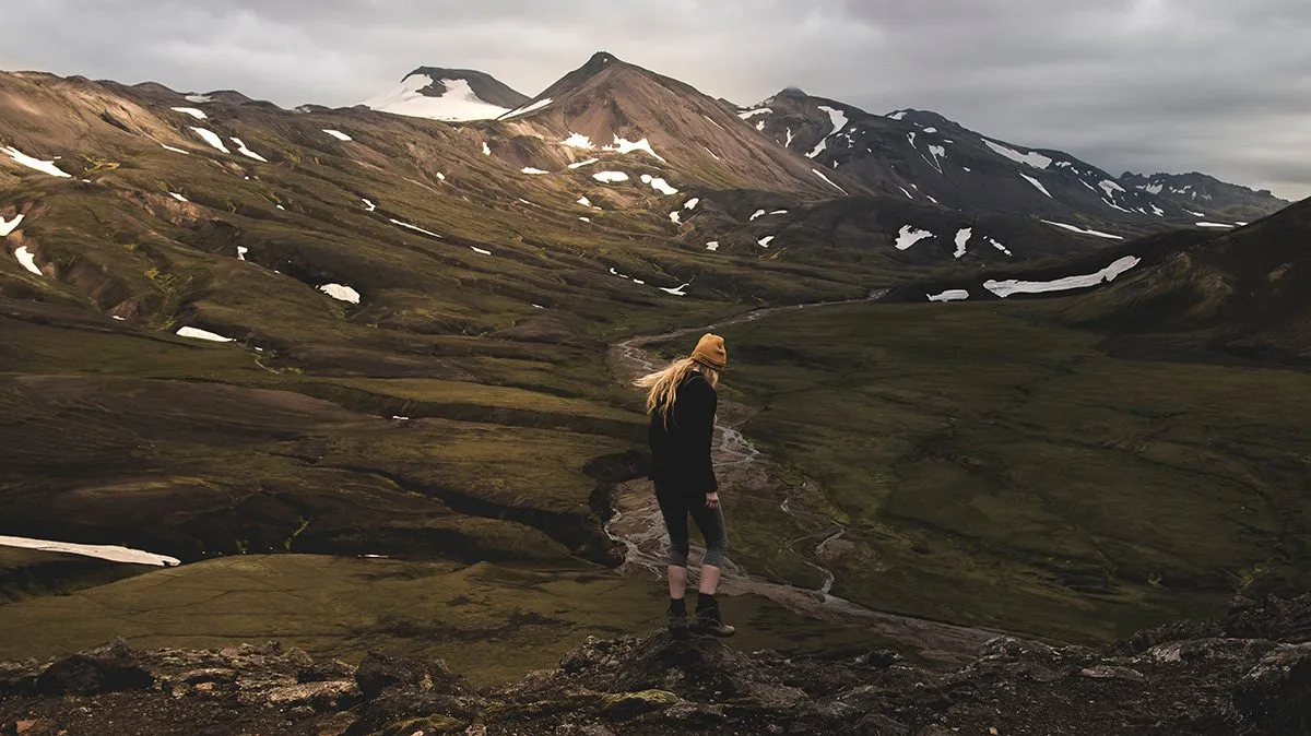 Girl walking in the mountains