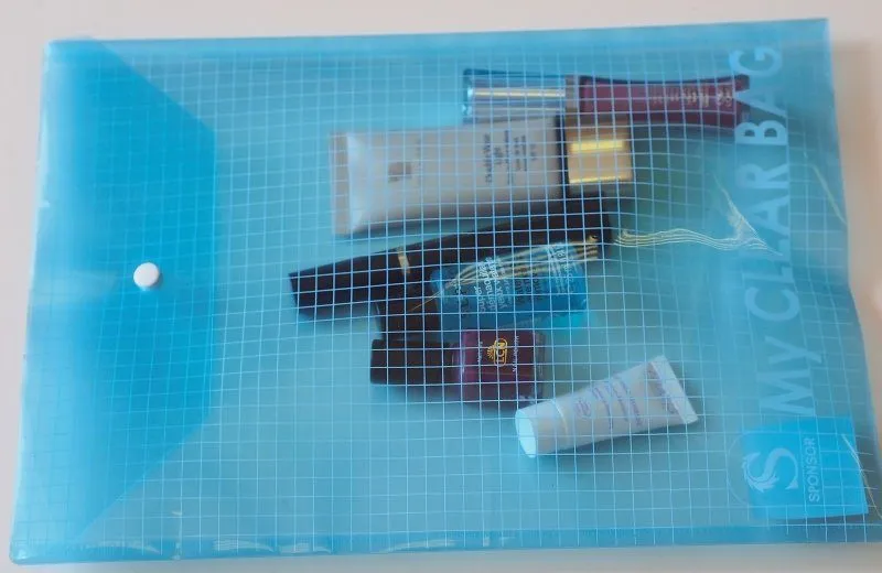 Cosmetic products in a transparent folder
