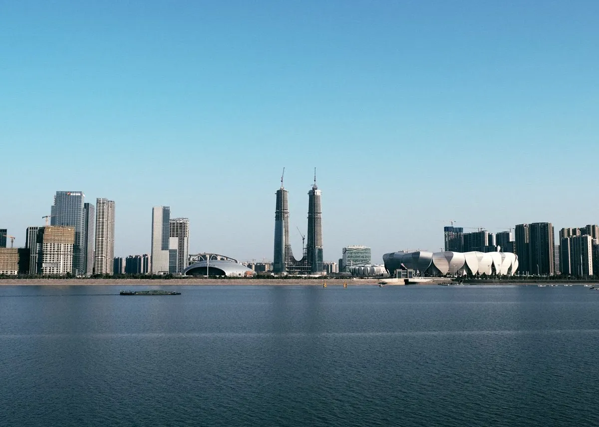 City visible on the opposite bank of the river
